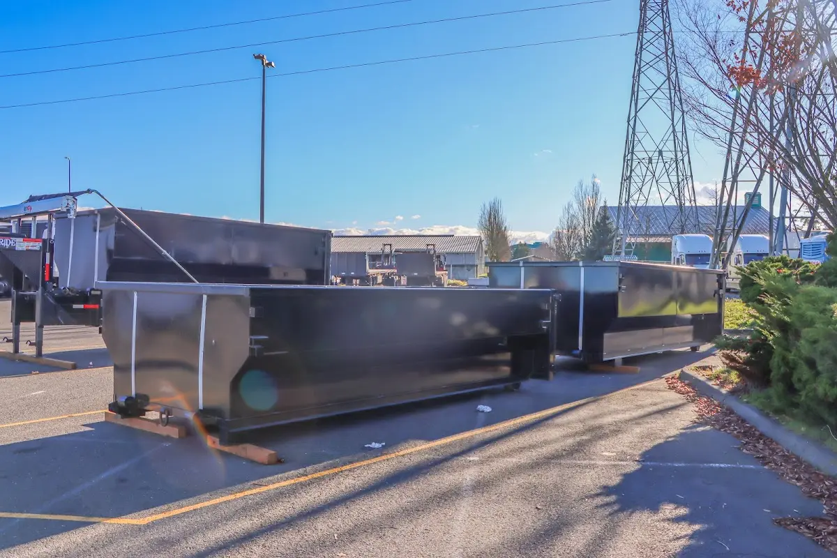 Roll-off dumpster ready for waste disposal at job site for 2 Yard Dumpster Rental in Bourbonnais
